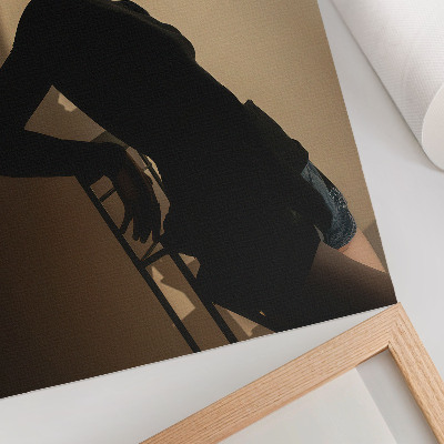 Wandposter Dunkle Silhouette einer Frau, ein Lichtstrahl, Frieden