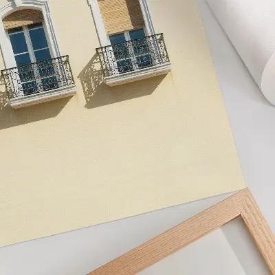 Kunstdruck auf Leinwand cremefarbene Fassade mit schwarz-weißen Fenstern im klassischen Stil