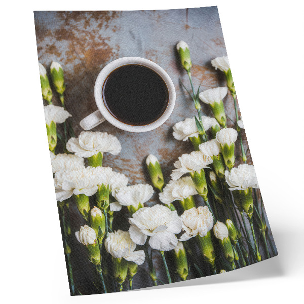 Poster Eine Tasse Kaffee und weiße Nelkenblüten