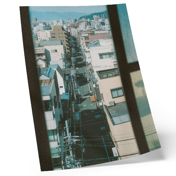 Wandposter Moderne Stadtlandschaft mit Bergen