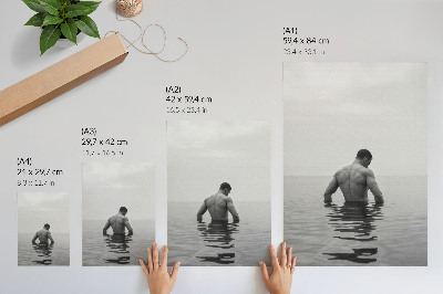 Kunstdruck leinwand Mann kopfüber im ruhigen Wasser vor grauem Hintergrund