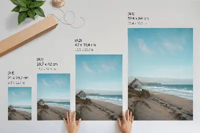 Kunstdruck auf Leinwand Strand und Wellen mit Haus auf einer Klippe in Pastellfarben