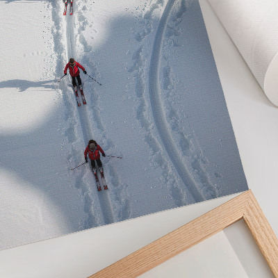 Wandposter Skifahrer im Schnee in roten Jacken