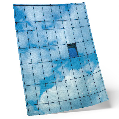 Poster Eine Glasfassade, die Himmel und Wolken reflektiert