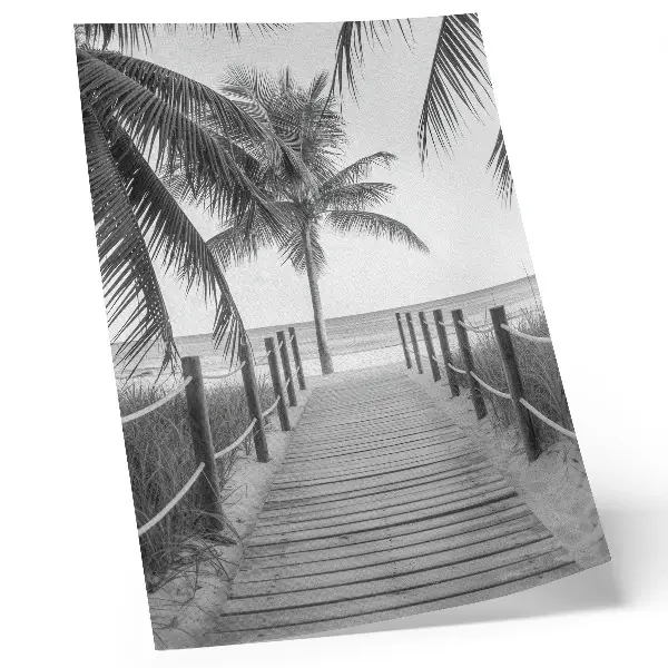 Wandposter tropischer Steg mit Palmen vor einem endlosen Sandstrand