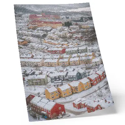 Leinwand-Kunstdruck bunte Häuser in einer winterlichen Landschaft