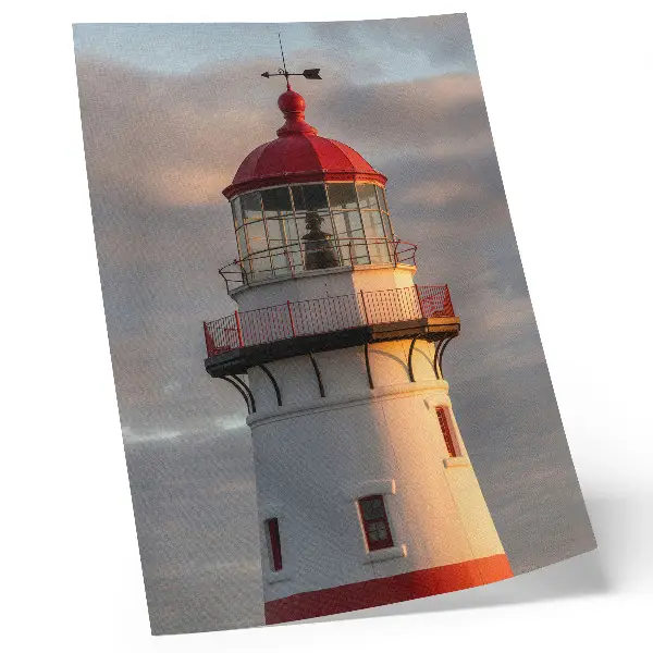 Kunstdruck auf Leinwand roter Leuchtturm bei ruhigem Sonnenuntergang