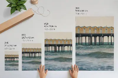 Leinwand-Kunstdruck Gelbe Häuser am Meer für Modernität und Frieden