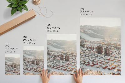 Poster Winterlandschaft mit schneebedeckten Häusern