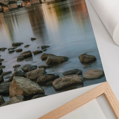 Poster Ein malerisches Panorama der Stadt mit einer Brücke über den Fluss