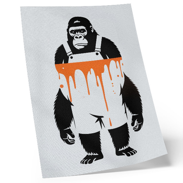 Kunstdruck leinwand Ein Gorilla in Latzhose vor einem leuchtend orangefarbenen Hintergrund