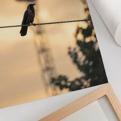 Leinwand-Kunstdruck vogel auf einer leitung vor zartem abendhimmel