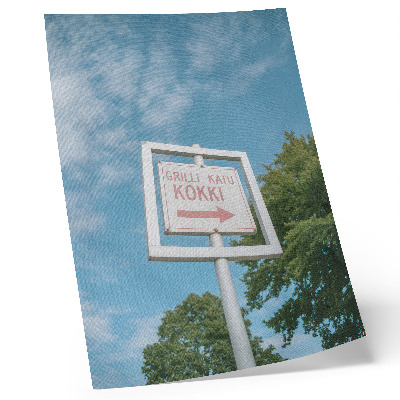 Wandposter Eine weiße Tafel vor blauem Himmel