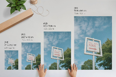 Wandposter Eine weiße Tafel vor blauem Himmel