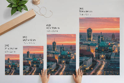 Poster Moderne Stadt am Abend in warmem Licht