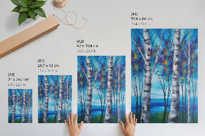 Wandposter Farbenfrohe Birken vor blauem Hintergrund und warmen Akzenten