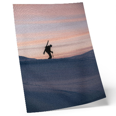 Kunstdruck leinwand Skifahrer vor rosa Himmel in einer Winterlandschaft