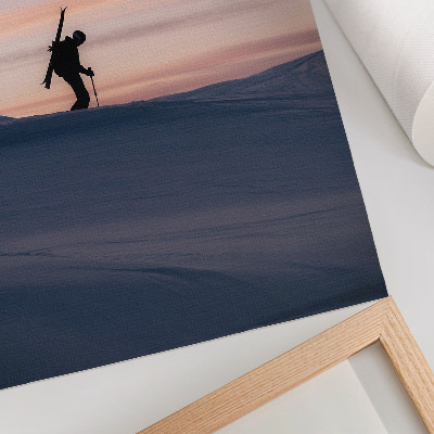 Kunstdruck leinwand Skifahrer vor rosa Himmel in einer Winterlandschaft