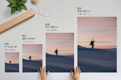 Kunstdruck leinwand Skifahrer vor rosa Himmel in einer Winterlandschaft