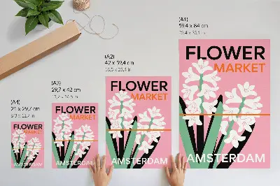 Wandposter mit weißen Blüten, rosa Schrift und grünem Kontrast