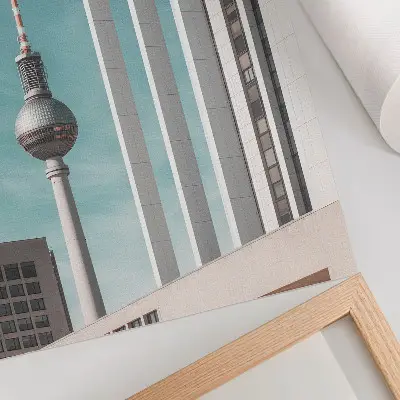 Poster minimalistischer Turm mit modernen Gebäuden unter blauem Himmel