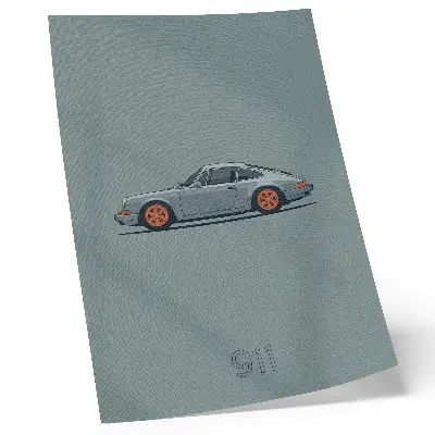 Leinwand-Kunstdruck klassisches Auto mit orangefarbenen Felgen auf grauem Hintergrund