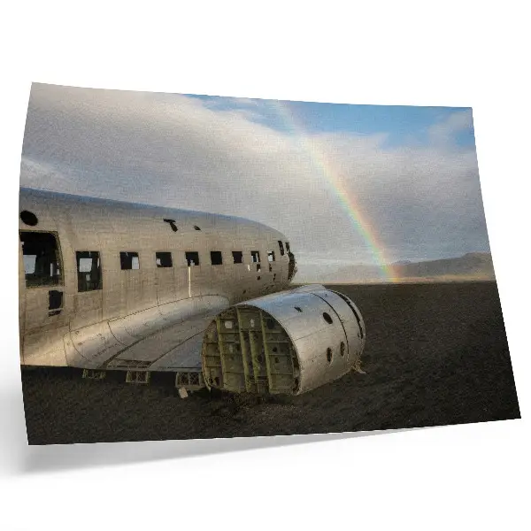 Poster flugzeugwrack aus Metall vor einem Regenbogen