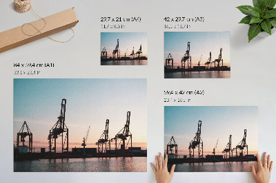Kunstdruck poster Kräne im Hafen bei Sonnenuntergang