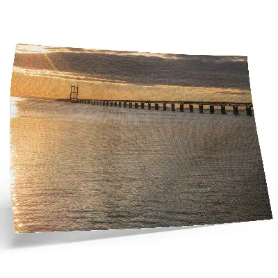 Kunstdruck eine Brücke am Horizont im Sonnenschein