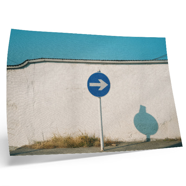 Kunstdruck poster Ein minimalistisches Schild vor einer weißen Wand