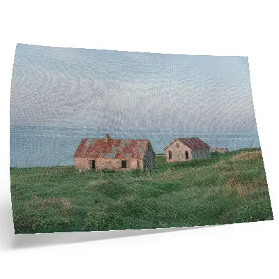 Kunstdruck rustikale Gebäude mit grünen Wiesen und Meerblick