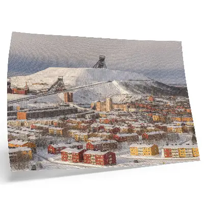 Poster Winterstadt mit farbenfrohen Gebäuden im Kontrast zum Schnee