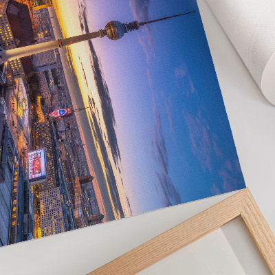 Kunstdruck poster Die Stadt am Abend in den atemberaubenden Farben des Sonnenuntergangs.