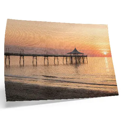 Poster mit einem bezaubernden Sonnenuntergang über dem Wasser