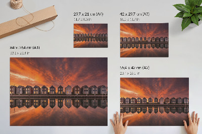 Poster Bunte Häuser am Wasser im Licht der Abenddämmerung