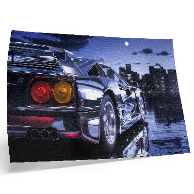 Poster Ein Sportwagen in einer urbanen Landschaft bei Nacht