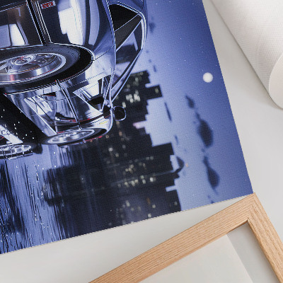 Poster Ein Sportwagen in einer urbanen Landschaft bei Nacht