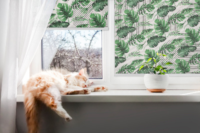 Fensterrollo innen mit tropischen Blättern