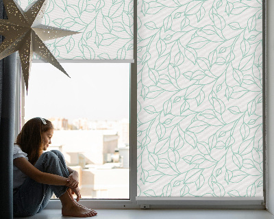 Fensterrollo innen in türkiser Farbe mit Blättermuster