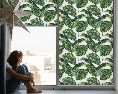 Fensterrollo mit exotischen Blättern