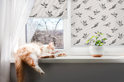 Fensterrollo mit Vogelmotiv