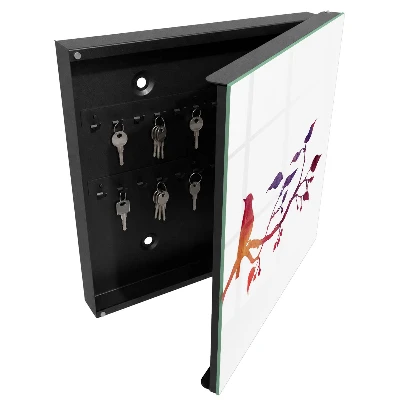 Schlüsselschrank Ein Ast mit einem Vogel