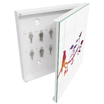 Schlüsselschrank Ein Ast mit einem Vogel