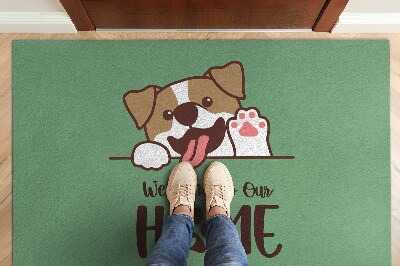 Fußmatte Welcome to our home Hund auf grünem Hintergrund