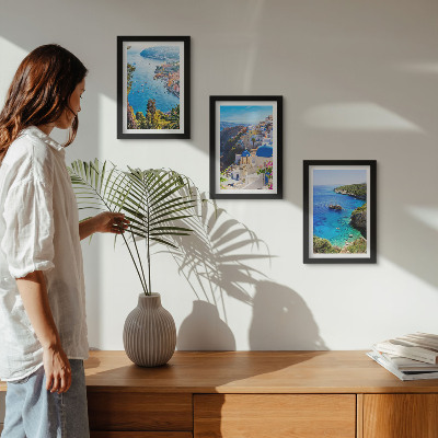 Bilderset mit rahmen Griechische Küstenlandschaft und die Stadt Oia auf Santorin