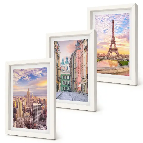Bilderwand mit einer Ansicht der Städte New York, Paris und Warschau in der Abenddämmerung