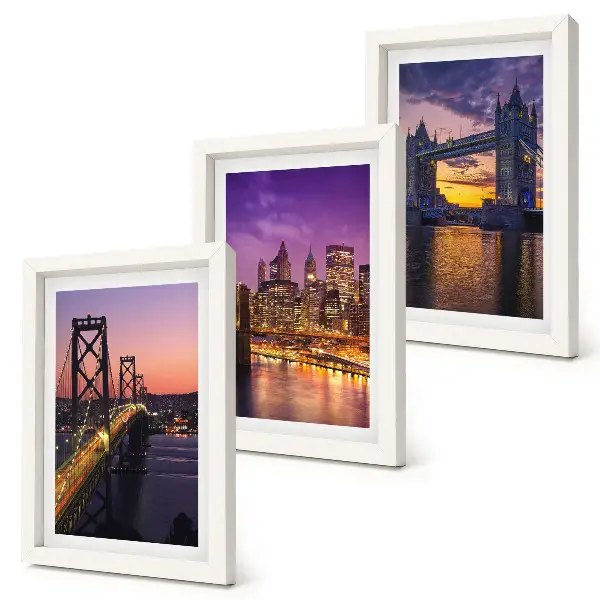Bilderwand mit Brücken und Stadtansichten im Sonnenuntergang