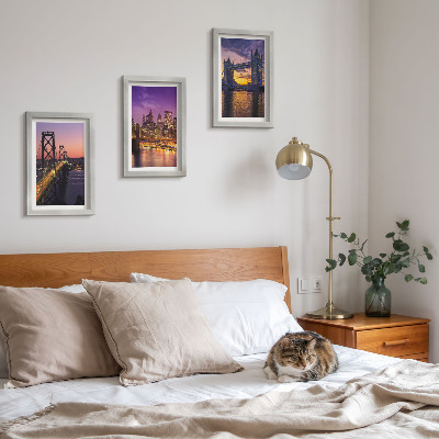 Bilderwand Brücken und Stadtansichten im Sonnenuntergang