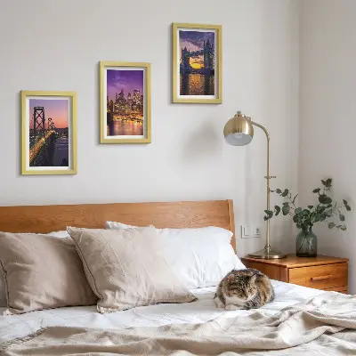 Bilderwand mit Brücken und Stadtansichten im Sonnenuntergang