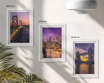Bilderwand mit Brücken und Stadtansichten im Sonnenuntergang
